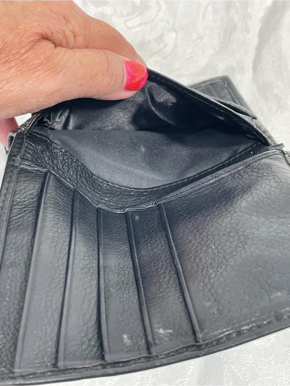 Brighton Vintage Tooled Leather Bifold Wallet in Black and Brown.